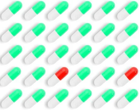 Seamless pattern of green pills on a white background. Pharmaceutical backgro Stock Photos