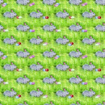 Seamless pattern with grey rabbits and Easter eggs on unfocused green grass. 스톡 사진