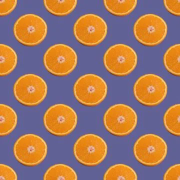 Seamless pattern of half of an orange isolated on Color of the year 2022 Very Stock Photos