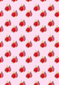 Seamless Pattern of Halved Fresh Figs on Light Pink Background Stock Photos