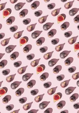 Seamless Pattern of Halved Fresh Figs on Light Pink Background Stock Photos