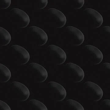 Seamless pattern of halves of black chocolate Easter eggs on a black backgrou Stock Photos