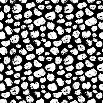 Seamless pattern with hand drawn white dots on black background. Polka texture Illustrazione stock