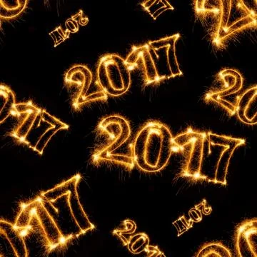 Seamless pattern of Happy New Year - 2017 with sparklers Stock Photos