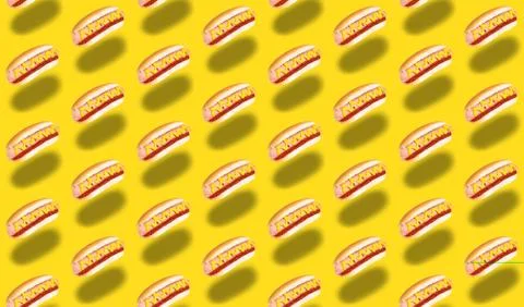 Seamless pattern of hot dogs on yellow background Stock Photos