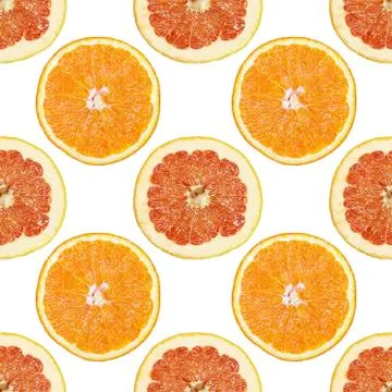 Seamless pattern of isolated slices of grapefruit and orange. Stock Photos
