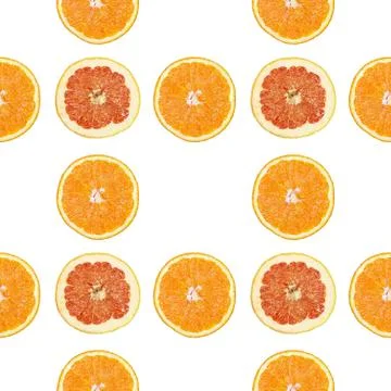 Seamless pattern of isolated slices of grapefruit and orange. Stock Photos
