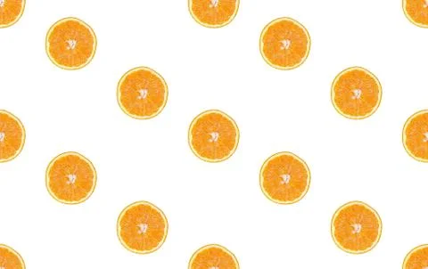 Seamless pattern of isolated slices of orange. Wallpaper for background, design Stock Photos