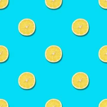 Seamless pattern with lemon on blue background. Stock Photos