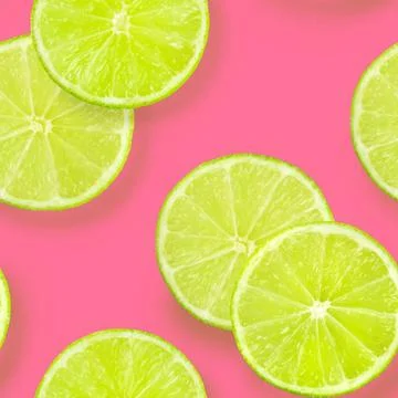 A seamless pattern of lime slices on a vibrant pink background, a fruity c... 스톡 사진