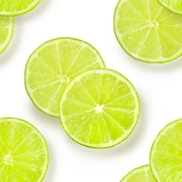 A seamless pattern of lime slices on a white background, a vibrant fruity citrus 스톡 사진