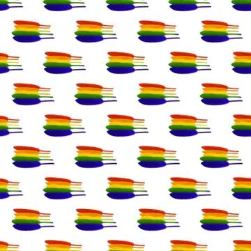 Seamless pattern of lined in rainbow colored bird feathers on a white backgro Foto stock