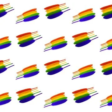 Seamless pattern of lined in rainbow colored bird feathers on a white background Foto stock