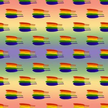 Seamless pattern of lined in rainbow colored bird feathers on a rainbow Foto stock