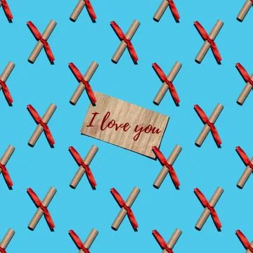 Seamless pattern of love notes from craft paper tied with a red ribbon Stock Photos