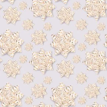 Seamless pattern made of gold colored ribbon bows. Stock Photos