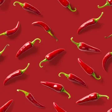 Seamless pattern made of red chili or chilli on red background. Minimal food  Stock Photos
