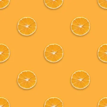 Seamless pattern with orange fruit on orange background.  Stock Photos
