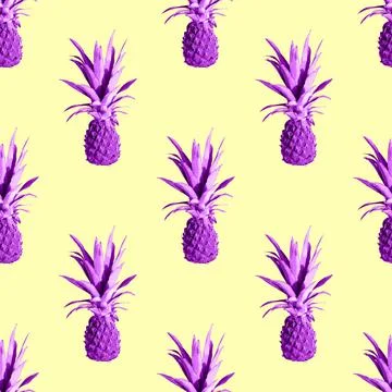 Seamless pattern of pink pineapples isolated on yellow background. Exotic Stock Photos