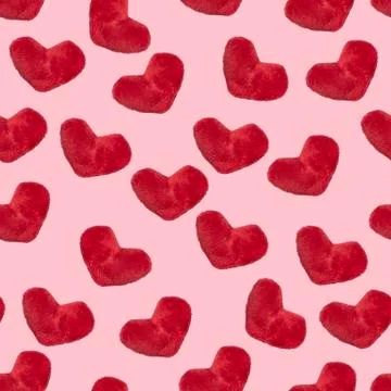 Seamless pattern, plush heart on a pink background, valentine's day or romant Stock Photos