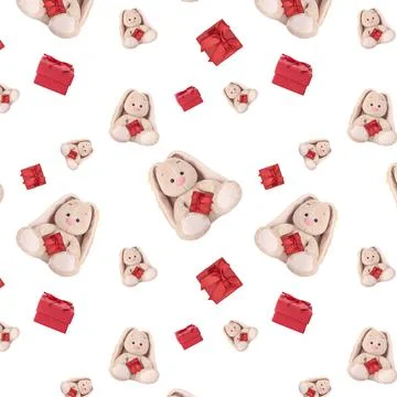 Seamless pattern with a rabbit and a red gift. Foto stock