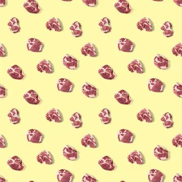 Seamless Pattern with raw pork meat slices on yellow background, food pattern Stock Photos