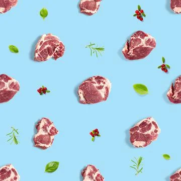Seamless Pattern with raw pork meat slices on blue background, food pattern Stock Photos