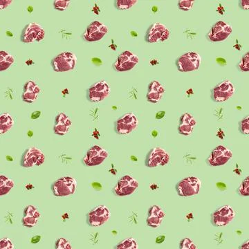 Seamless Pattern with raw pork meat slices on green background, food pattern Stock Photos