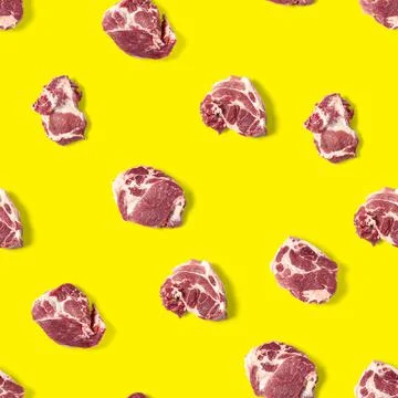 Seamless Pattern with raw pork meat slices on yellow background, food pattern Stock Photos