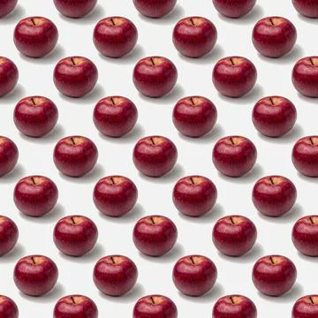 Seamless pattern of red apples on a white background Stock Photos
