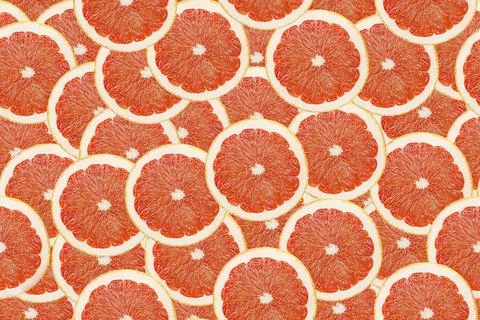Seamless pattern with red grapefruit. Full frame. Stock Photos