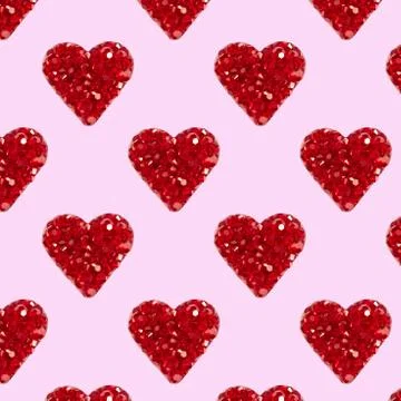 Seamless pattern with red hearts on a pink background. Shiny hearts  Stock Photos