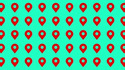 Seamless pattern of red map location pin icons on cyan background Stock Footage 344909799