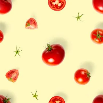 Seamless pattern with red ripe tomatoes. Tomato isolated on yellow background Stock Photos