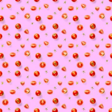 Seamless pattern with red ripe tomatoes. Tomato isolated on rose background.  Stock Photos