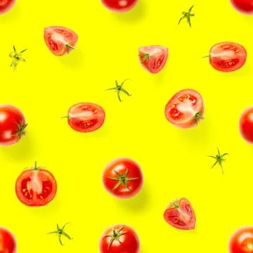 Seamless pattern with red ripe tomatoes. Tomato isolated on yellow background Stock Photos