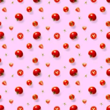 Seamless pattern with red ripe tomatoes. Tomato isolated on rose background.  Stock Photos
