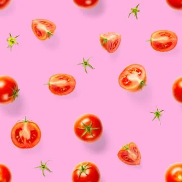 Seamless pattern with red ripe tomatoes. Tomato isolated on rose background.  Stock Photos