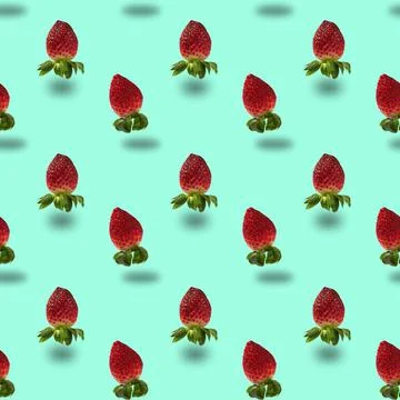 Seamless pattern with red strawberries on mint background Stock Photos