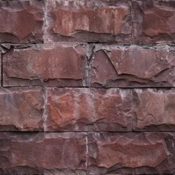 Seamless pattern of red wall from natural stone bricks. 스톡 사진