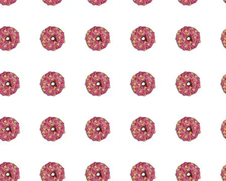 Seamless pattern with rows of pink doughnuts with hearts on white background Stock Photos