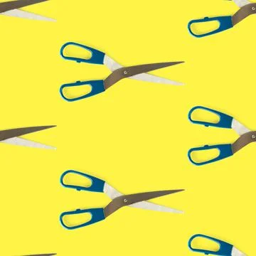 Seamless pattern of scissors separated from the yellow flat layer. Scissors with Stockillustratie