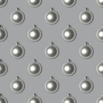 Seamless pattern with silver Christmas balls on a gray background.  Stock Photos