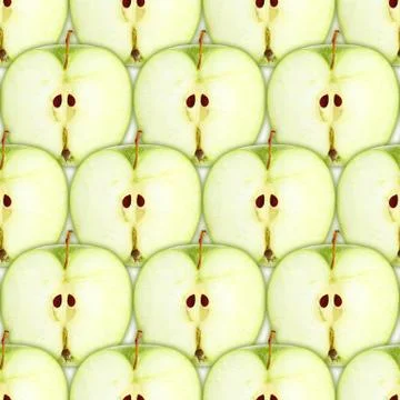 Seamless pattern with slices of green apple Stock Photos