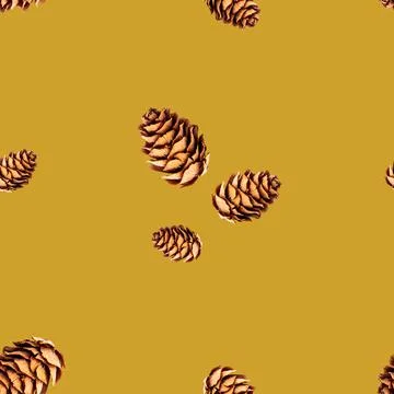 Seamless pattern of small pine cones isolated on yellow background Foto stock