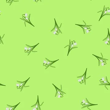Seamless pattern Snowdrop flowers with white petals and green leaves appearin Illustrazione stock
