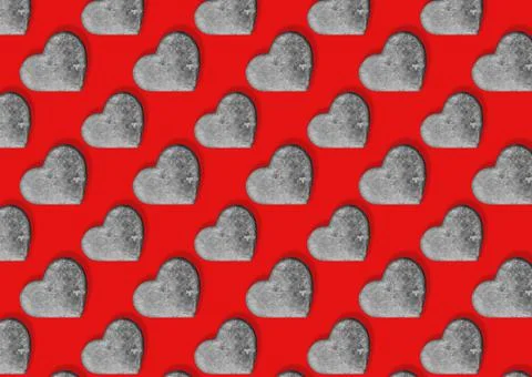 Seamless pattern with stone hearts on red. Stock Illustration