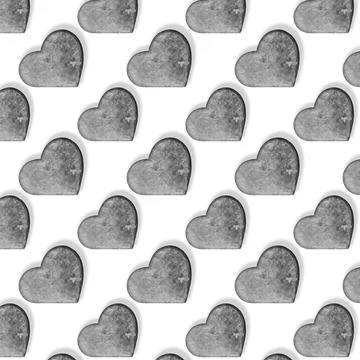 Seamless pattern with stone hearts on white. Stock Illustration