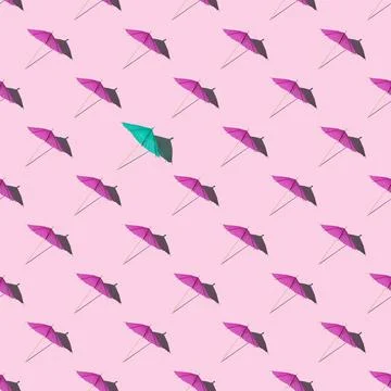Seamless pattern of summer mockup with many pink beach or cocktail umbrellas  写真素材