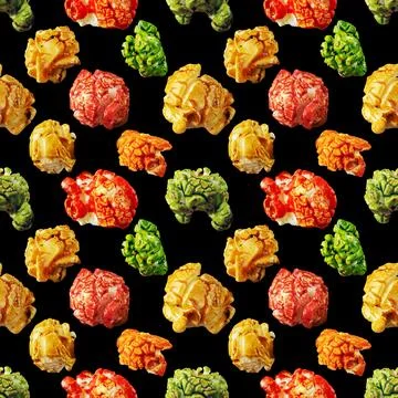 Seamless pattern of sweet popcorn rainbow on black background Stock Photos